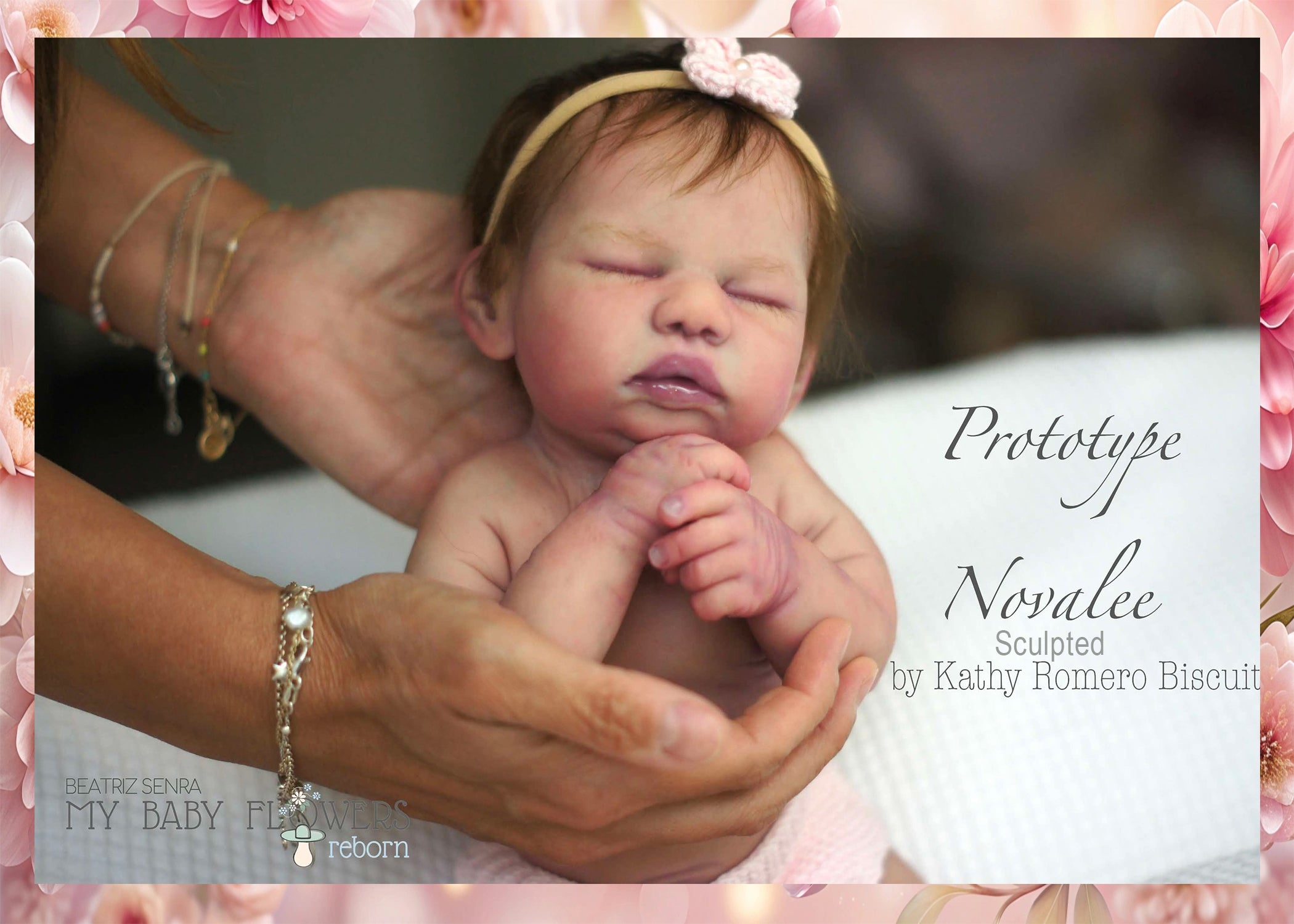 Newborn baby held in hands with decorative text and floral elements